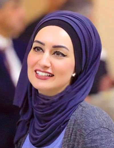 صورة عميدة الكلية